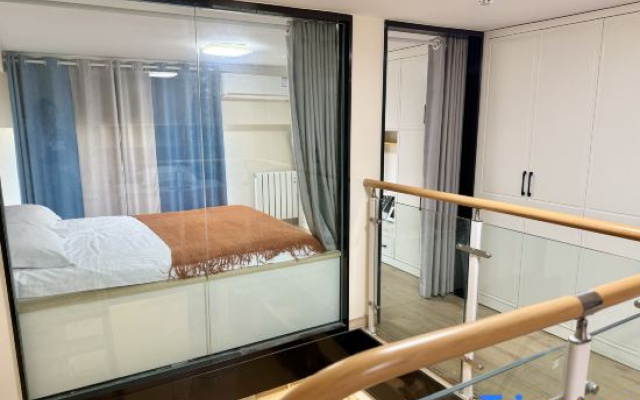Mu'en Loft Light Luxury Apartment (Qingdao North Railway Station)