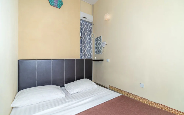 SPOT ON 90042 One Plaza Eco Hotel