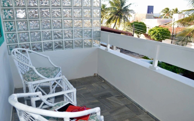 Casa Turquesa na Praia de Ponta Negra Por Carpediem