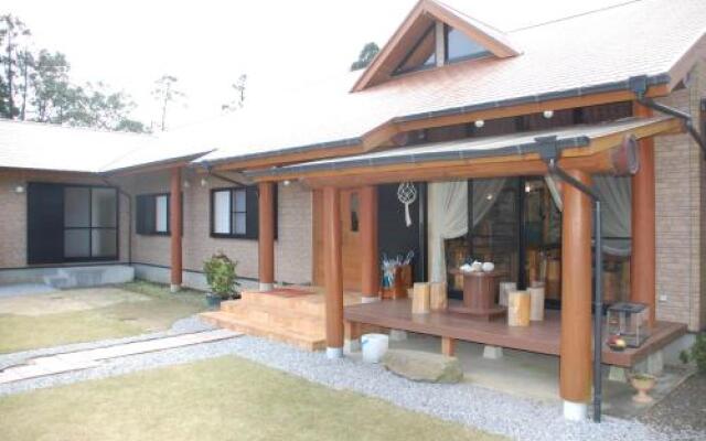 Отель Yakushima Pension Ichigoichie Япония, Якусима - отзывы, цены и фото номеров - забронировать отель Yakushima Pension Ichigoichie онлайн вид на фасад