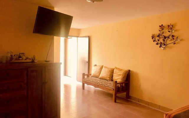Capital O Las Calzadas Hotel & Suites