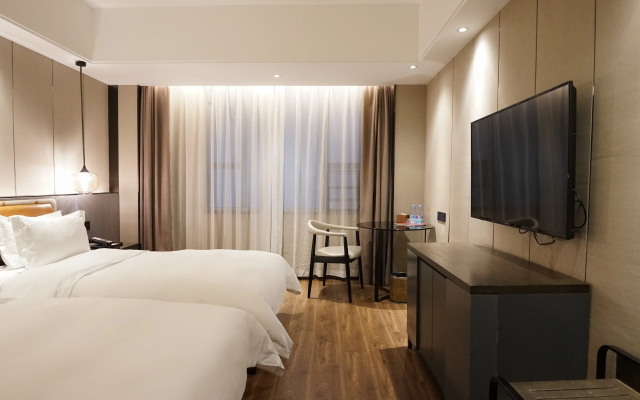 Paco Business Hotel Datang Metro Station