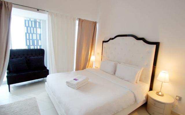 Отель Kennedy Towers - Cayan Tower 2 Bed комната для гостей