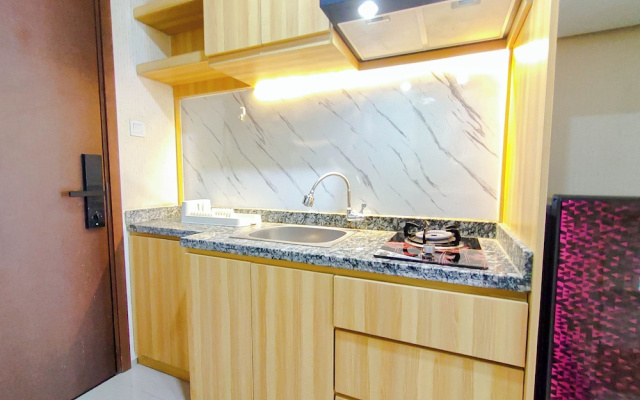 Wood Accents Studio At Grand Dharmahusada Lagoon Apartment