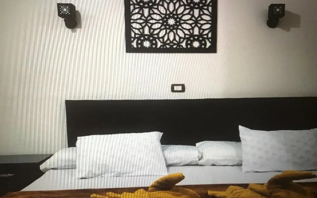 Shared Rooftop 1-bed Apartment Luxor View Nile