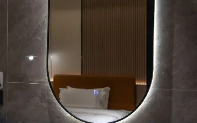 Yijia Hotel (Chengmai Jinjiang Qianqiu City Plaza)