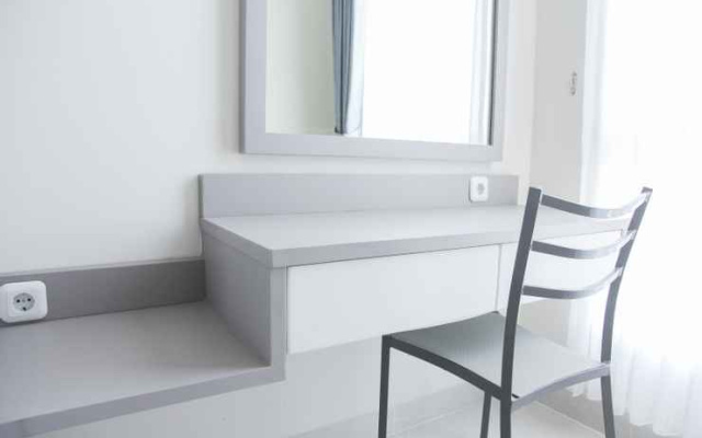 Homey Studio at Elpis Residence Apartment By Travelio