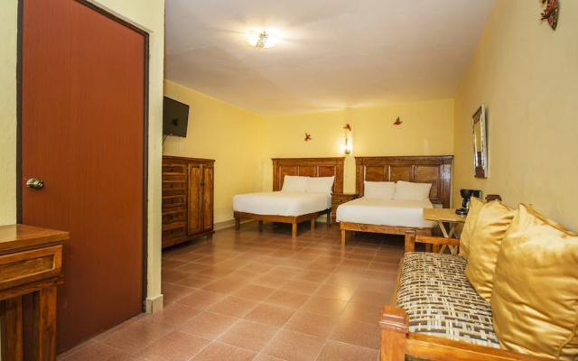 Capital O Las Calzadas Hotel & Suites