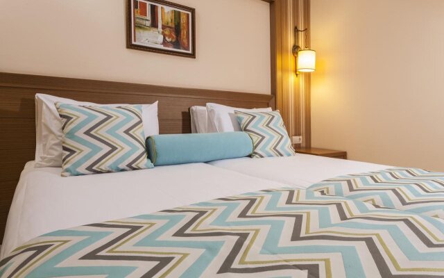 Iz Flower Side Beach Hotel All Inclusive Турция, Сиде - отзывы, цены и фото номеров - забронировать отель Iz Flower Side Beach Hotel All Inclusive онлайн вид на фасад