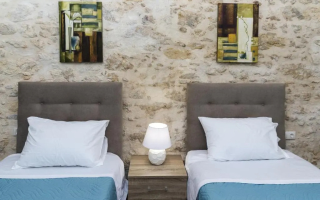2 bedrooms appartement with enclosed garden and wifi at Ρούστικα