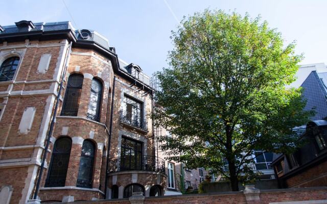 Апартаменты Sweet Inn Apartments Van Orley вид на фасад