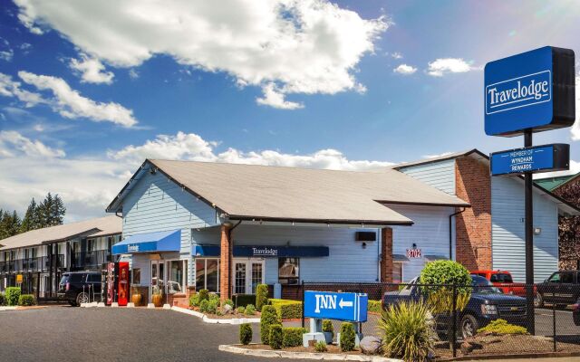 Отель Whiteroof Inn США, Такома - отзывы, цены и фото номеров - забронировать отель Whiteroof Inn онлайн вид на фасад