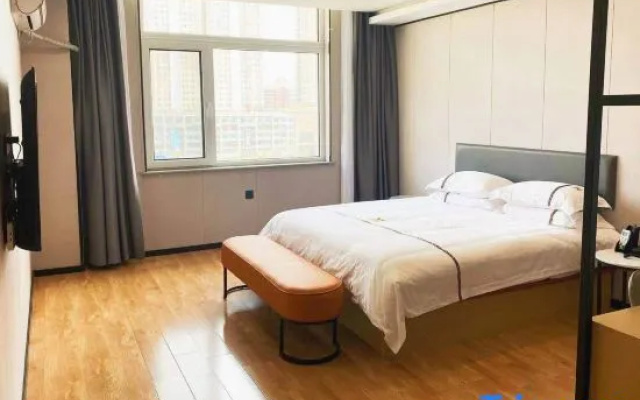 Wanjia Zhenxuan Hotel (long distance bus station)