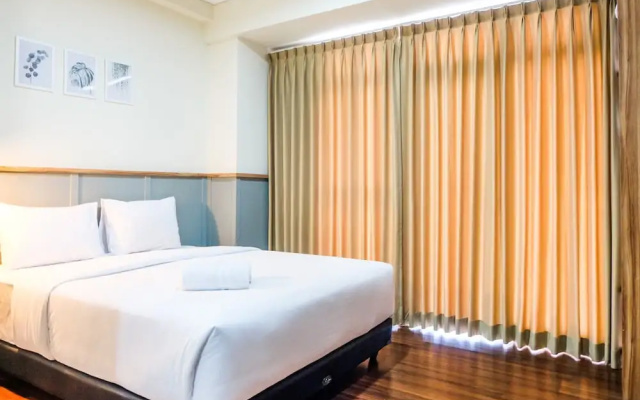 Modern and Fully Furnished Studio at Puri Orchard Apartment By Travelio