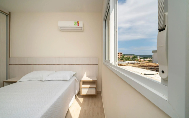 Conforto e 2 quartos perto da praia