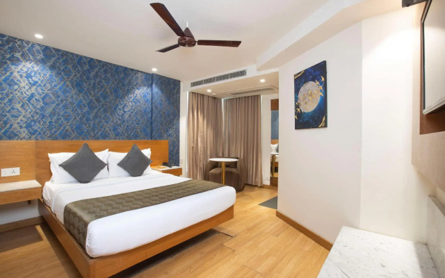 Capital O 27044 Hotel The Orion Plaza