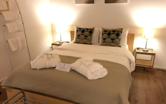 Dorf-Hotel "Apartments & Rooms"