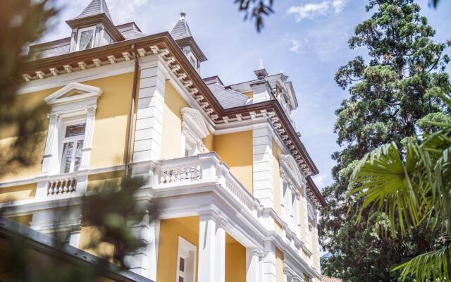 Отель Villa Helvetia Меран вид на фасад