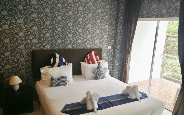 Апартаменты Grande Elegance Serviced Apartment вид на фасад