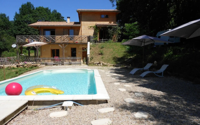 Apartment Facing the Pool in a Wooden House