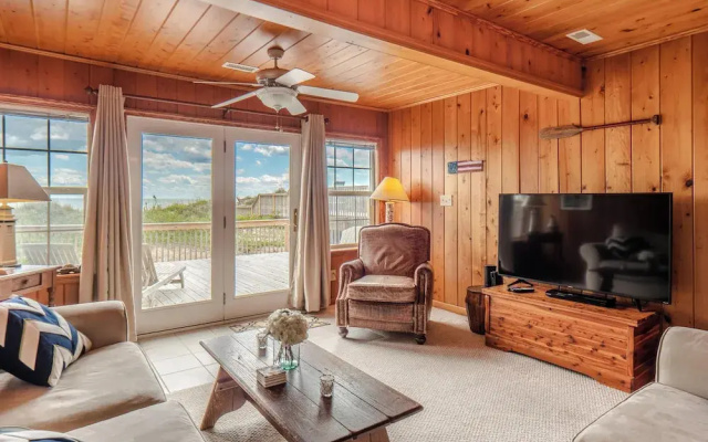 A Charm of Finches by Topsail Realty