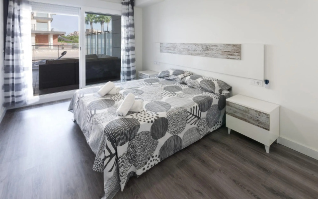 BREZO - Apartment with shared pool in Oliva Nova . Free WiFi