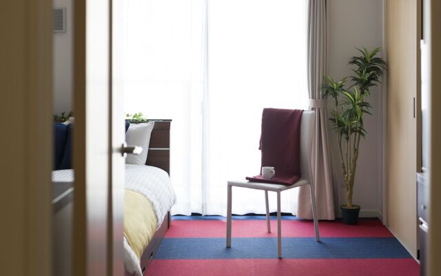 Residence Hotel Hakata 18 Фукуока комната для гостей