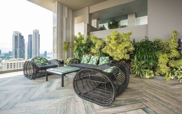 Отель Riviera Wongamat Condo By Favstay Паттайя вид на фасад