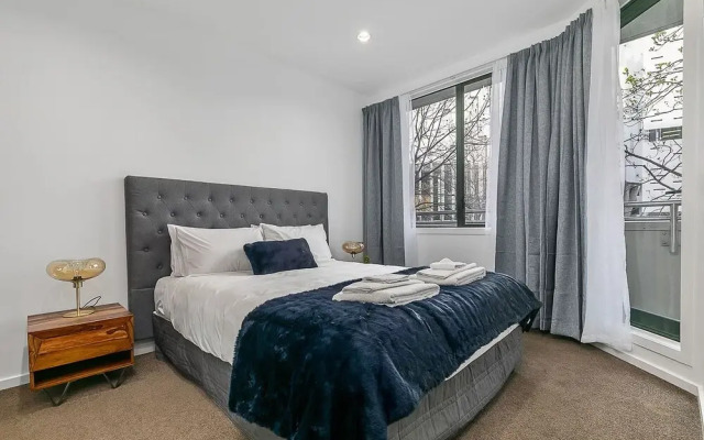 Zodiak Central 2 BR Apt Free Parking Gym