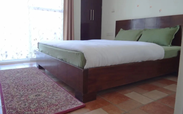 Luxury Suites overlooking lake at Naukuchiatal Nainital