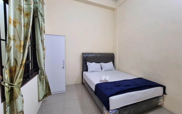 OYO 90785 Mutiara Guest House