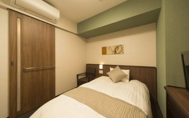 Отель Dormy Inn Premium Kanda