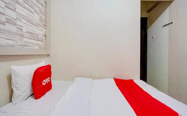 OYO Life 90606 Glass House Citraland Syariah