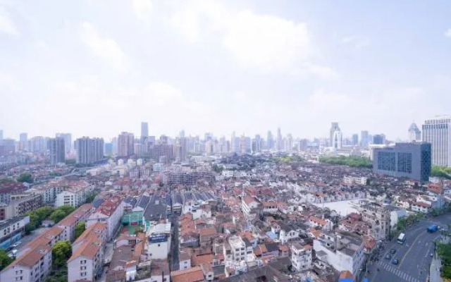 Merit Homestay (Shiliupu)