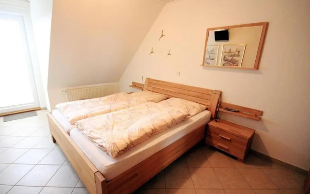 Ferienwohnung-10-mit-Balkon-Garten-Landhaus-Hubertus-Duhnen