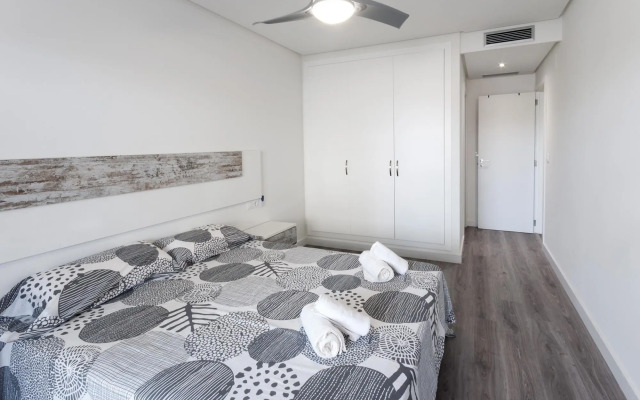BREZO - Apartment with shared pool in Oliva Nova . Free WiFi