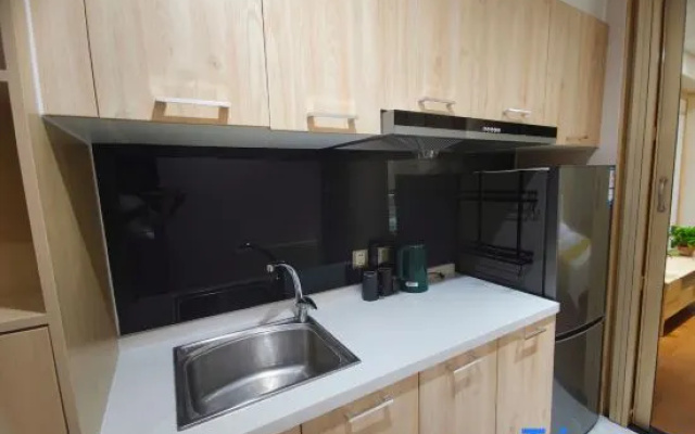 Muhai Lvsu Seaview Apartment (Development Zone Shibeiwan Water Park Branch)