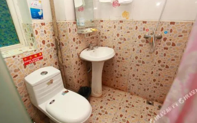 Kuaile Yijia Business Hotel