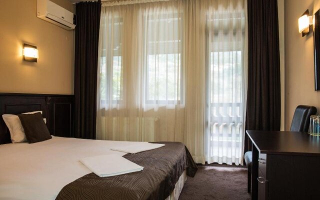 Отель Chiflika Family Hotel Болгария, Асеновград - отзывы, цены и фото номеров - забронировать отель Chiflika Family Hotel онлайн комната для гостей