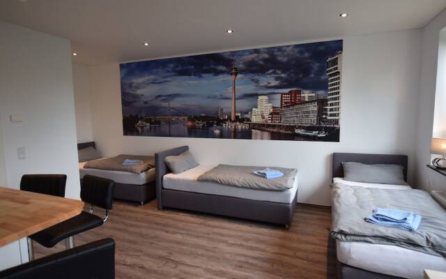 Отель Ferienwohnung Düsseldorf комната для гостей
