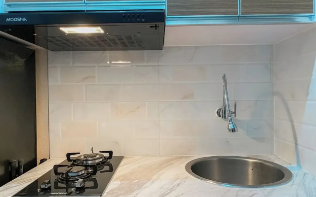 Warm and Homey Studio at Podomoro Golf View Apartment