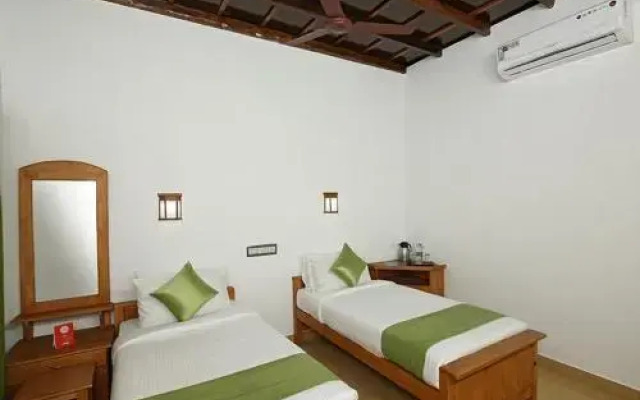 Coir Village Lake Resort by OYO