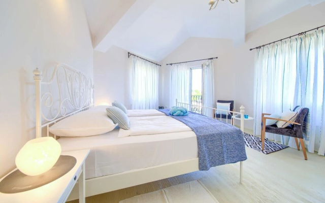 Stunning Home in Malinska With Wifi, Outdoor Swimming Pool and Heated Swimming Pool