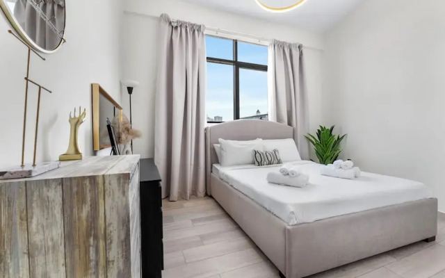 Waves - Stylish 1BR in JVC with Balcony & Pool
