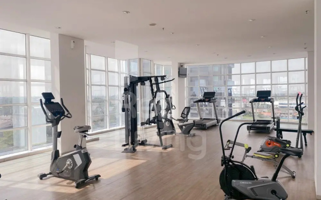 RedLiving Apartemen Treepark City - Nuansa Property Tower Alpine