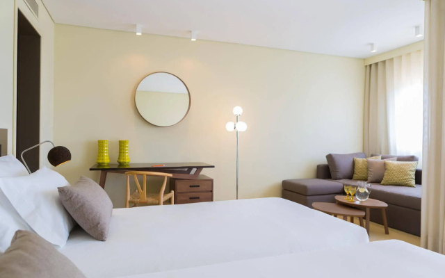Ozadi Tavira Hotel