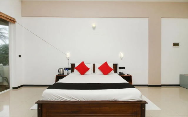 Capital O 311 Grace Beach Resort