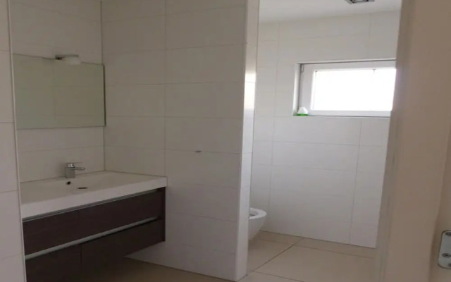 Spacious 10-person Villa in Quiet Holiday Park