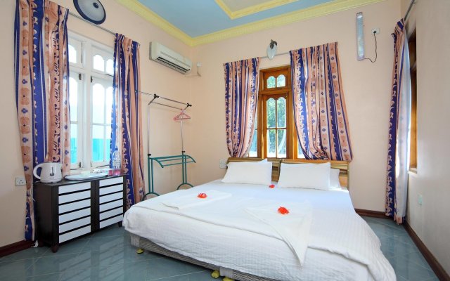 Отель Najaf Lakeview Guest House Мальдивы, Атолл Каафу - отзывы, цены и фото номеров - забронировать отель Najaf Lakeview Guest House онлайн комната для гостей