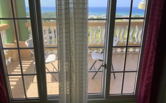 Poinciana House